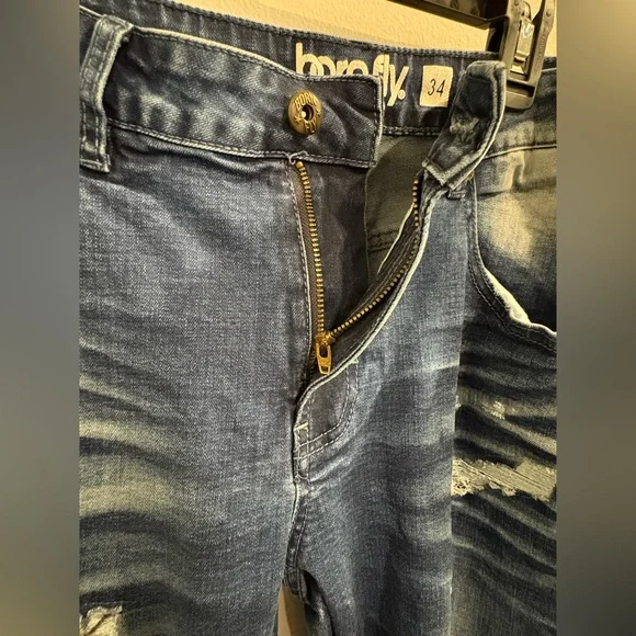 Stylish Blue Jeans with Olive Embroidered Accents - Picture 7 of 16